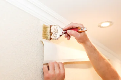 Pose de papier peint à Génat — revêtements muraux et toiles de verre